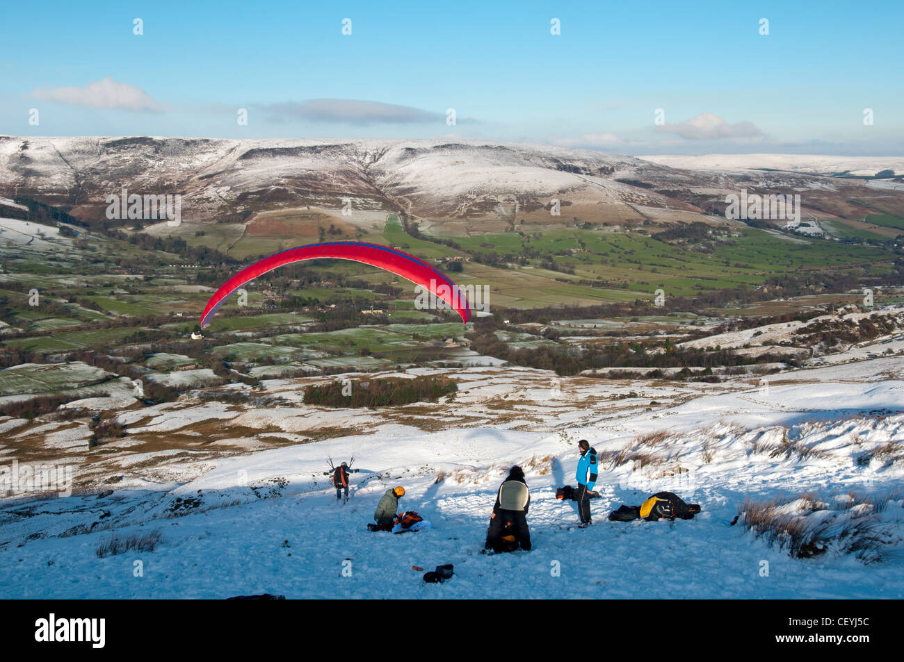 A paraglider launching off Rushup Edge, Edale, Peak District
