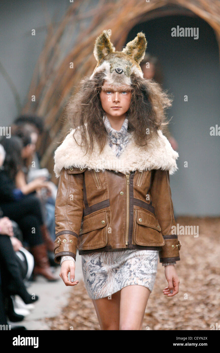 Unique London Ready to Wear Autumn Winter Animal hat, leather jacket with  white fur, patterned short dress Stock Photo - Alamy