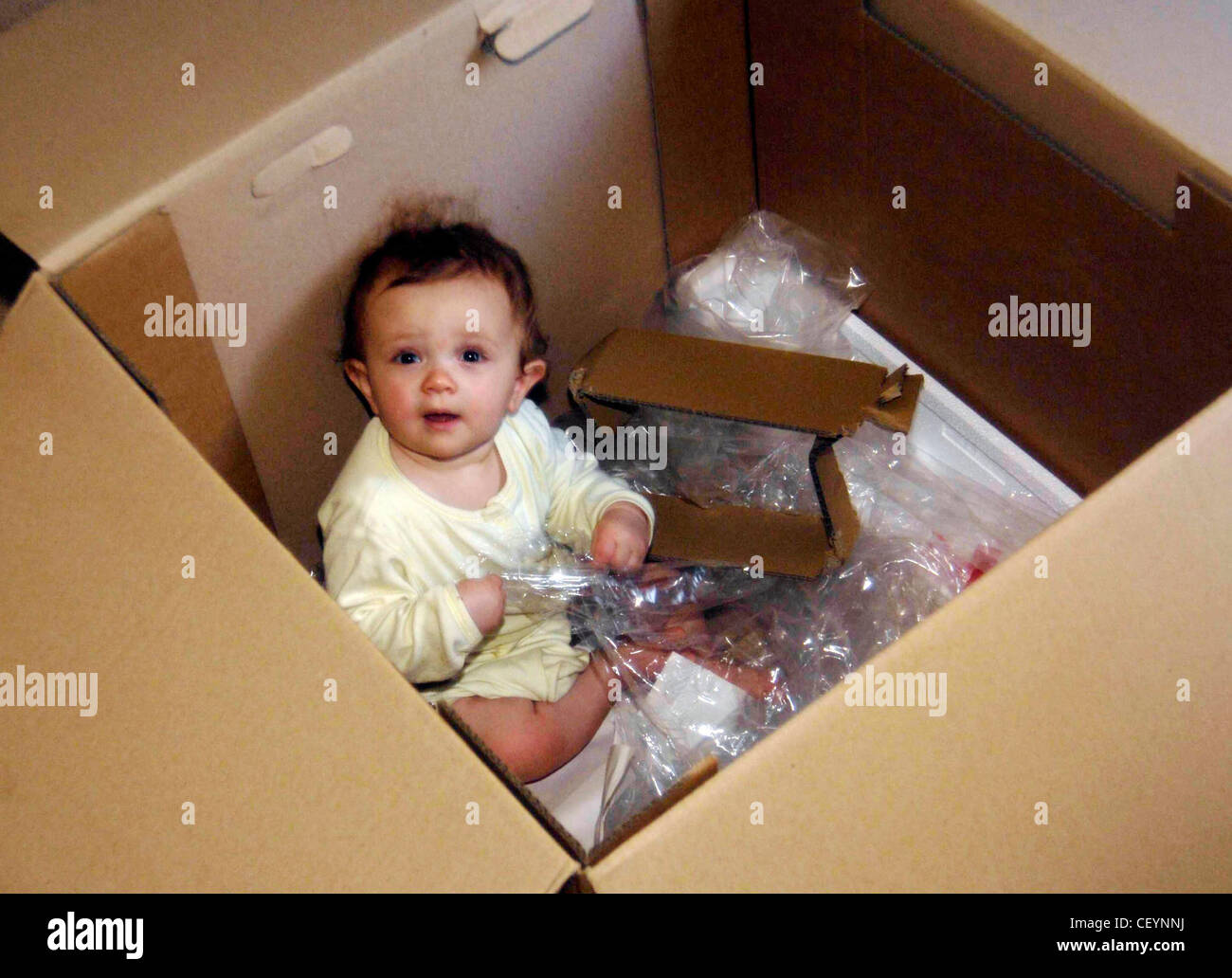 Baby in a box hi-res stock photography and images - Alamy
