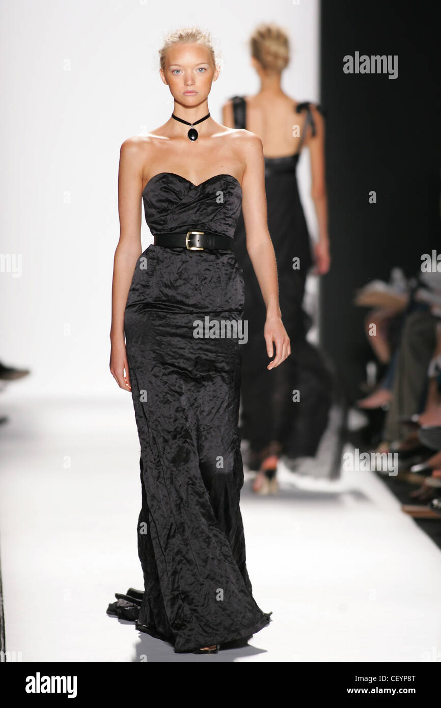 Michael Kors New York Ready to Wear Spring Summer Model Gemma Ward blonde  hair off face wearing floorlength black crushed satin Stock Photo - Alamy