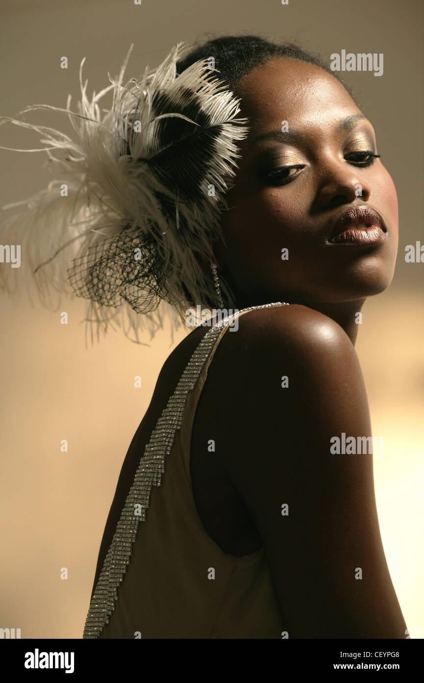 embellished feathers and hat netting 