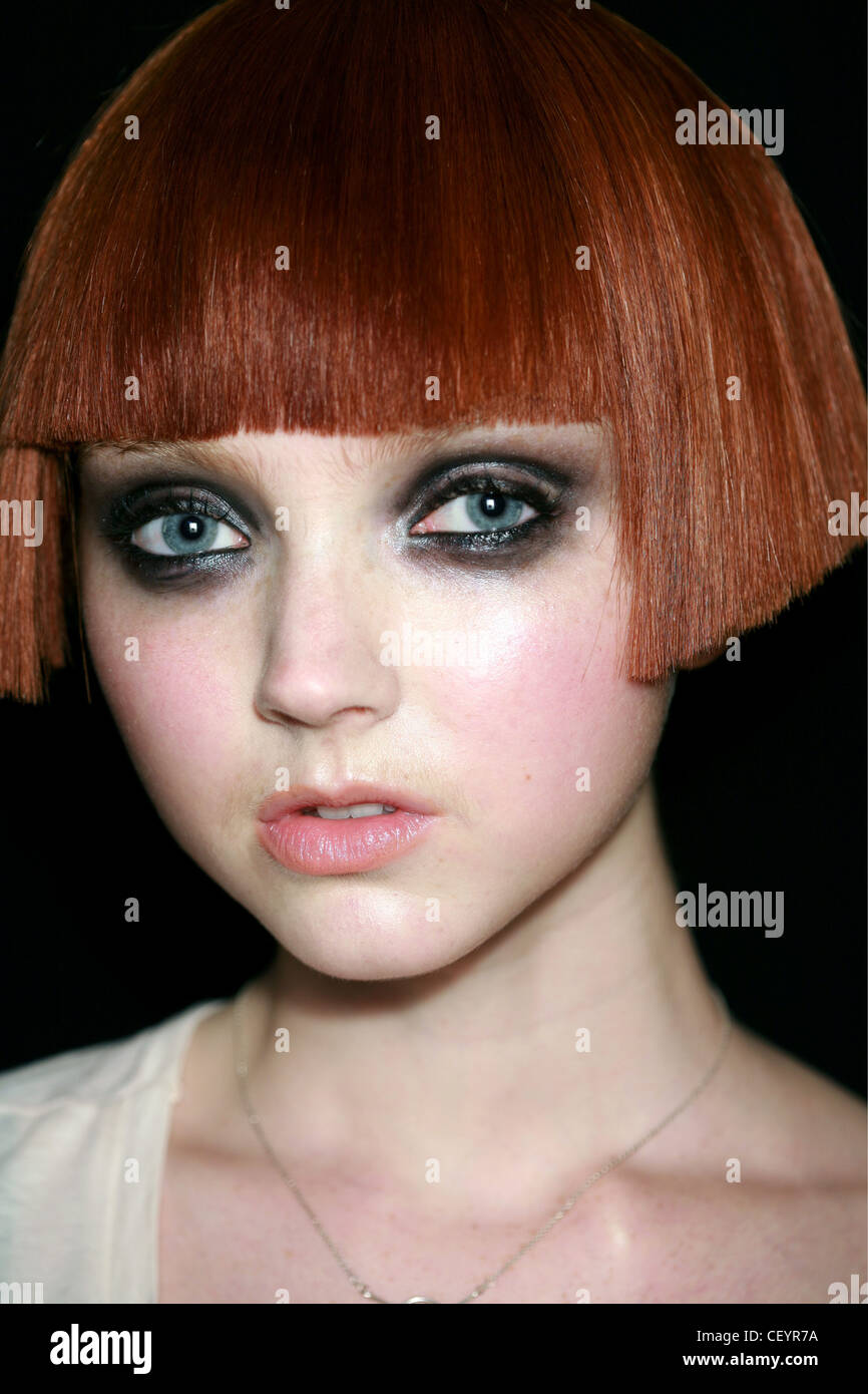 Christian Lacroix Backstage Paris Ready to Wear Spring Summer Headshot of British model Lily Cole blunt fringed short bob hair Stock Photo
