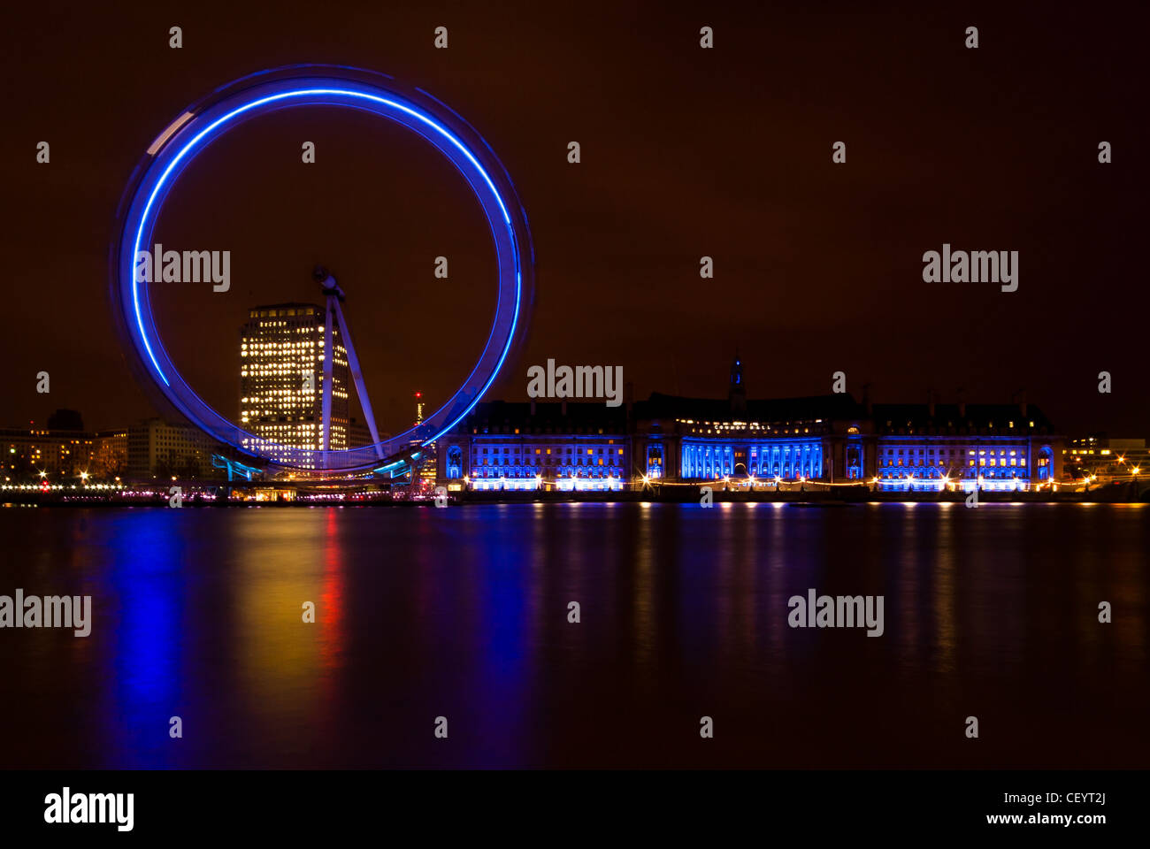 London Eye and County Hall at Night Stock Photo
