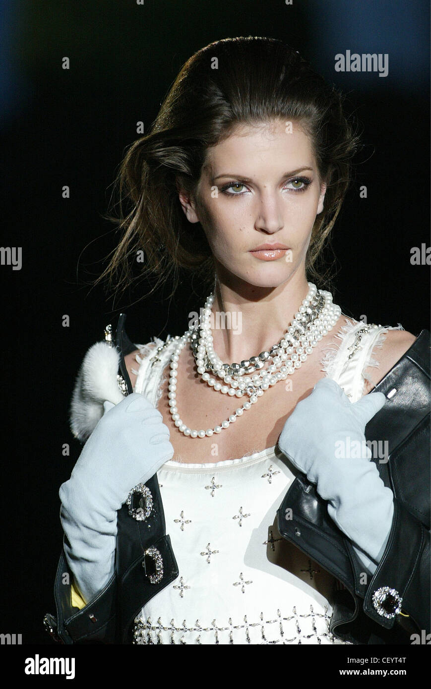 Dsquared Ready to Wear Milan A W Close up of model Diana Dondoe long  straight brunette hair off face wearing strings of pearls Stock Photo -  Alamy