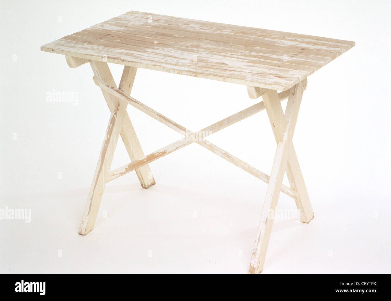 Renovating furniture, flea market finds an old garden table Stock