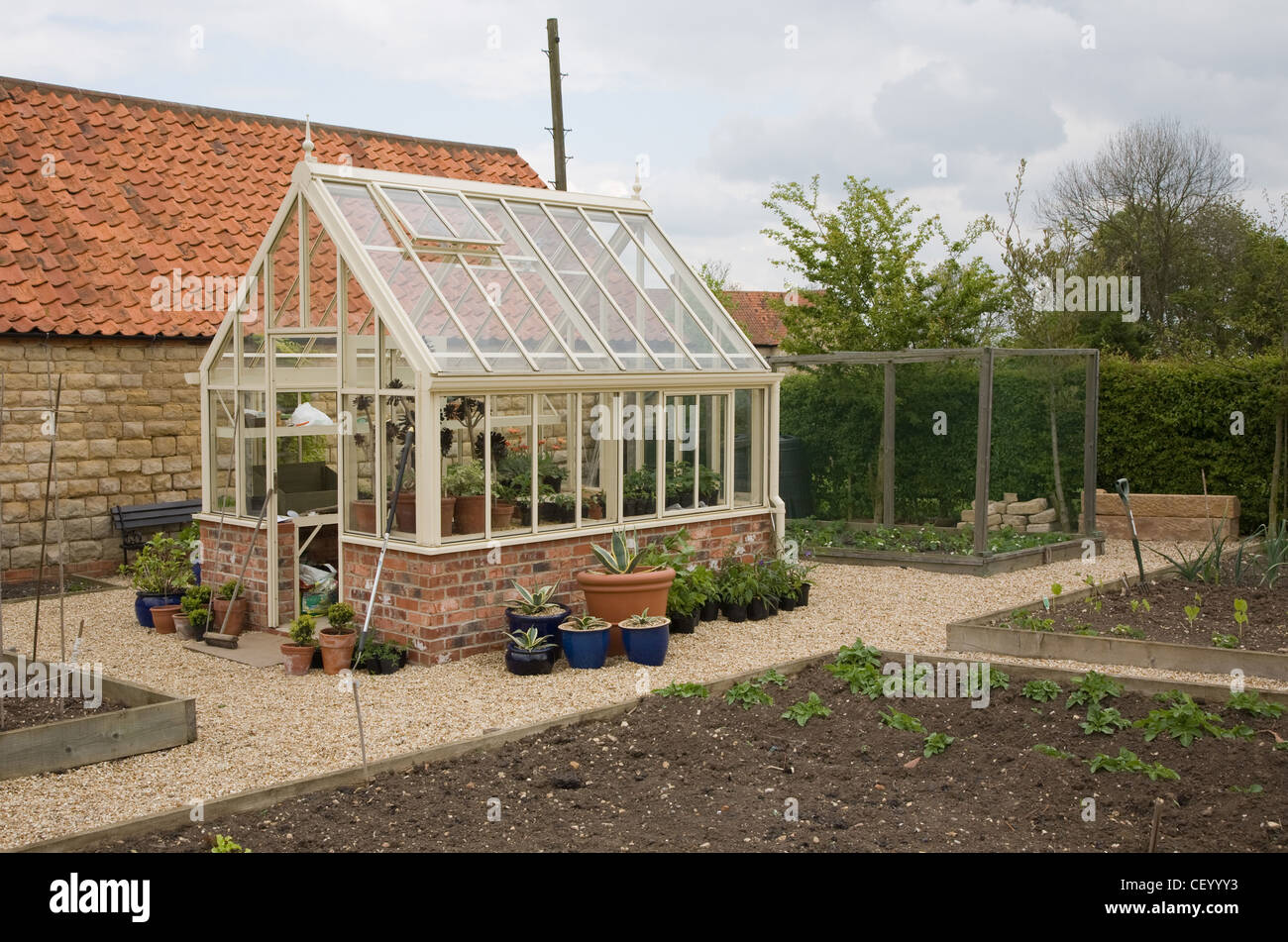 The Moat Garden The Kitchen Garden With Greenhouse And Raised Beds Stock Photo Alamy