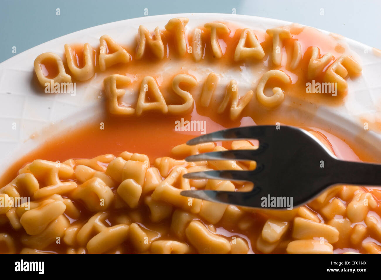 quantitative easing made out of alphabetti spaghetti letters Stock Photo