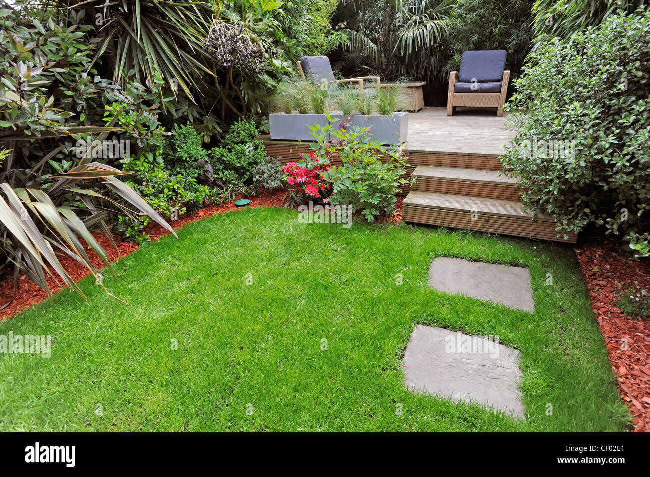 urban oasis a small garden with patio and raised decking area in