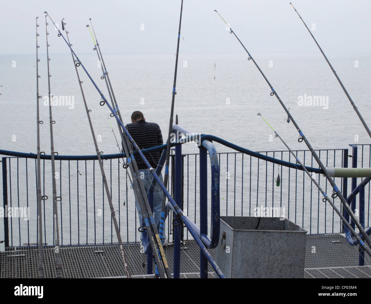 Lots of fishing rods hi-res stock photography and images - Alamy