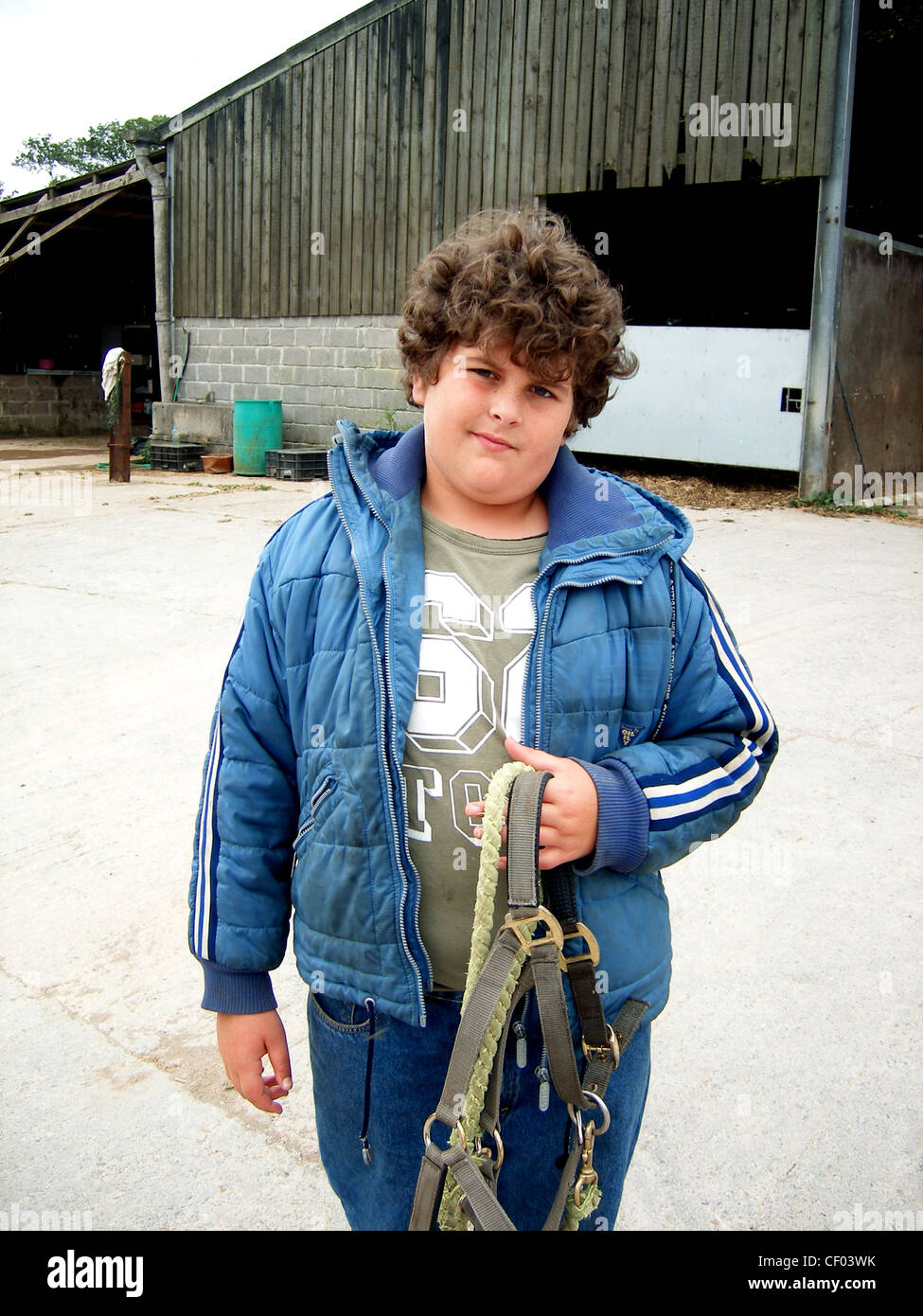 khaki top and blue jeans