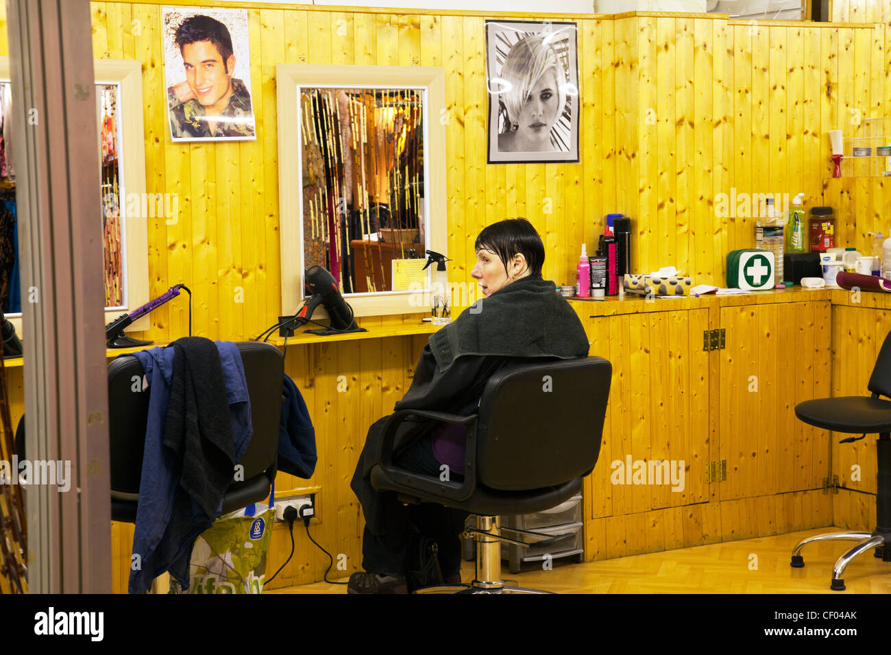 Grimsby Town, North Lincolnshire, England lady sat in hairdressers