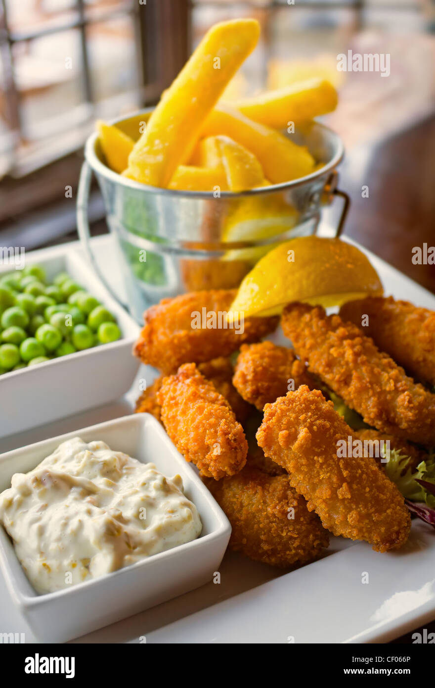 Fresh Scampi and chips pub meal Stock Photo - Alamy