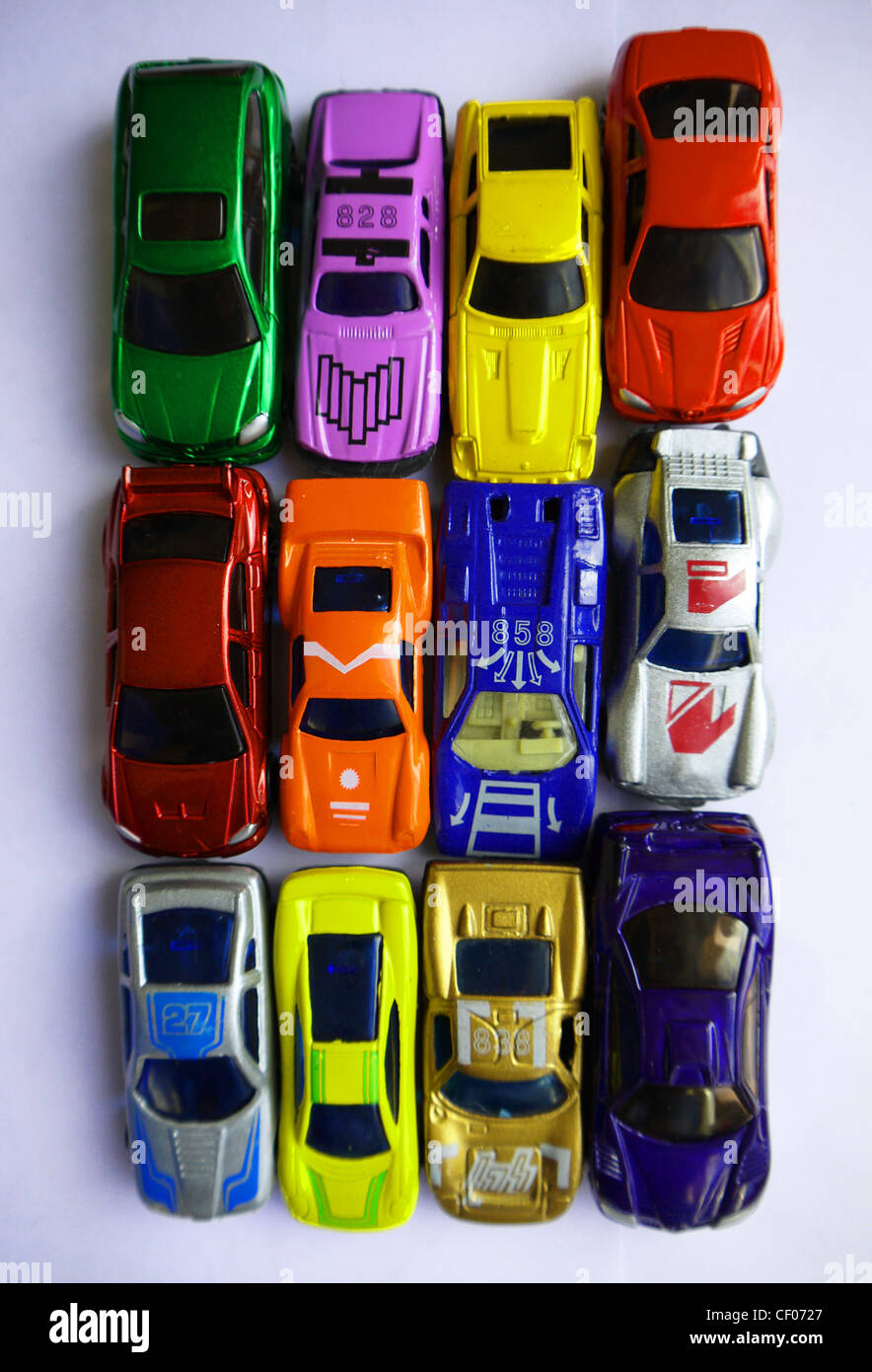 12 toy cars on a white background Stock Photo