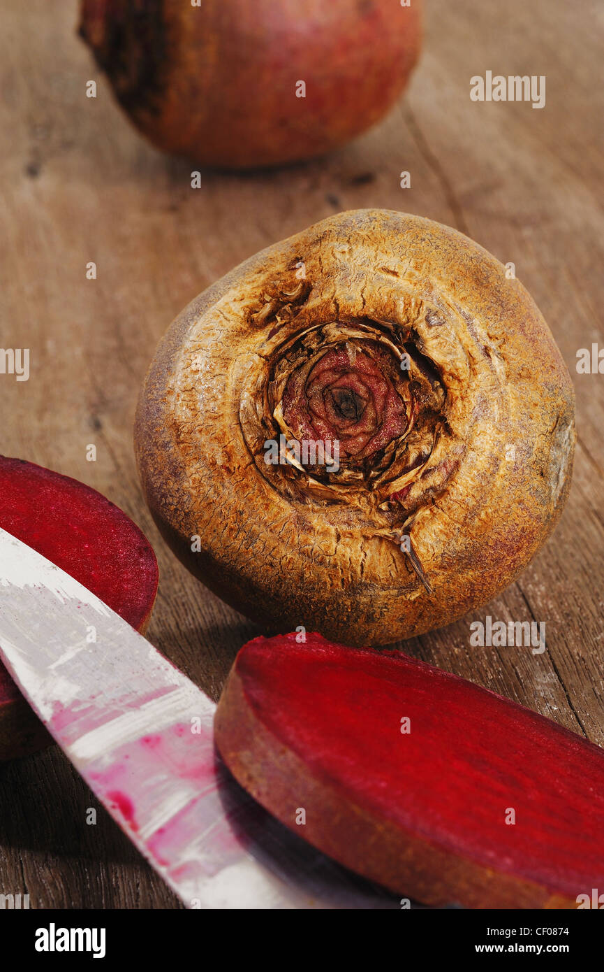 beet roots on wooden background Stock Photo - Alamy
