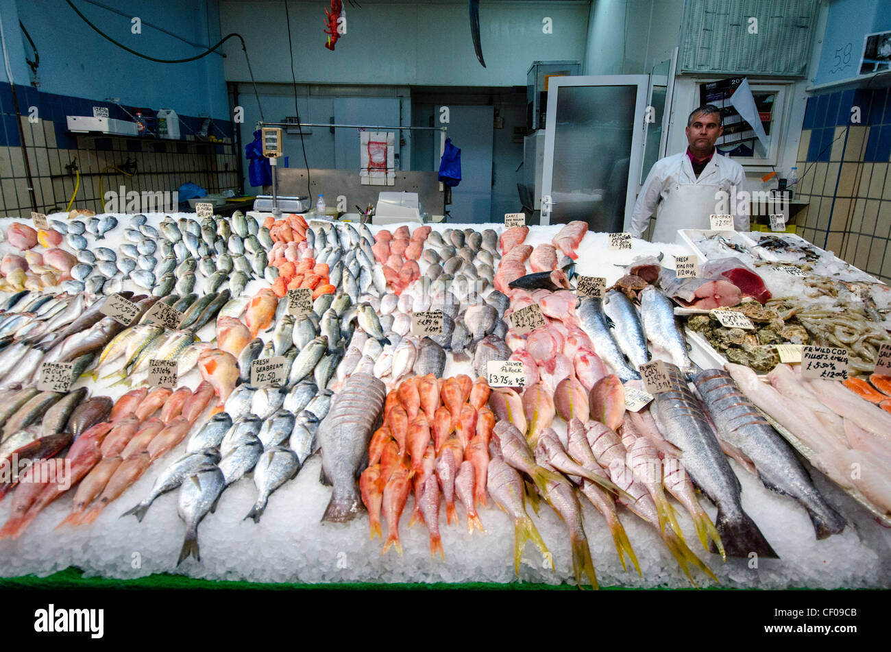 Fish stalls Brixton Village newly renovated in Brixton indoor market South London England Great Britain UK Stock Photo