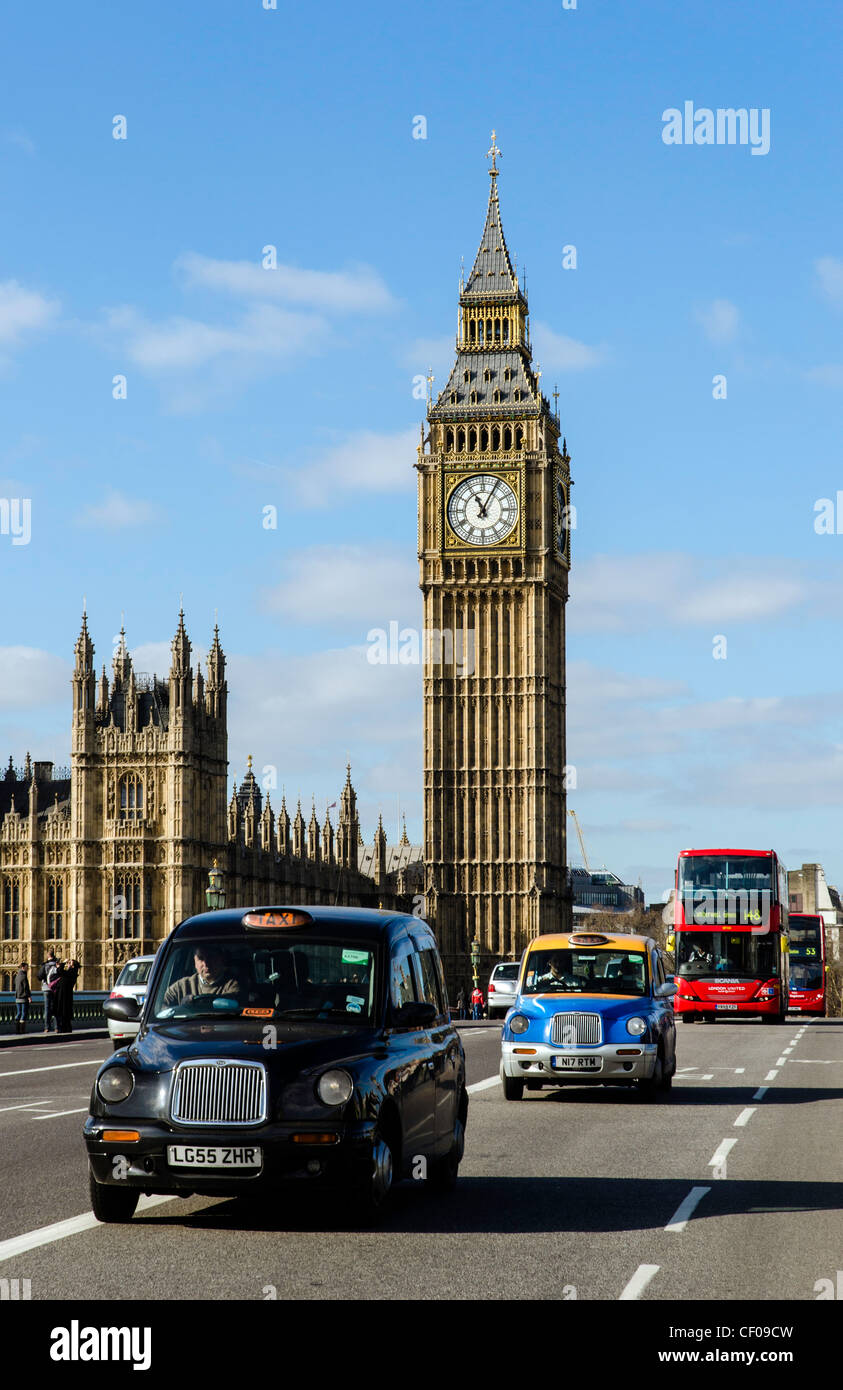 London taxi driving across Westminster Bridge with the Big Ben in the background London England Great Britain UK Stock Photo
