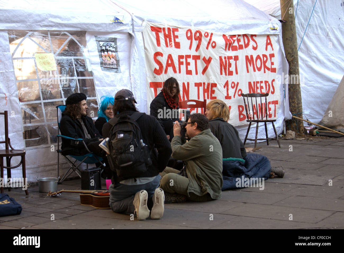 Protesters camped outside St Paul's Cathedral, London - part of the Occupy London campaign against corporate greed Stock Photo