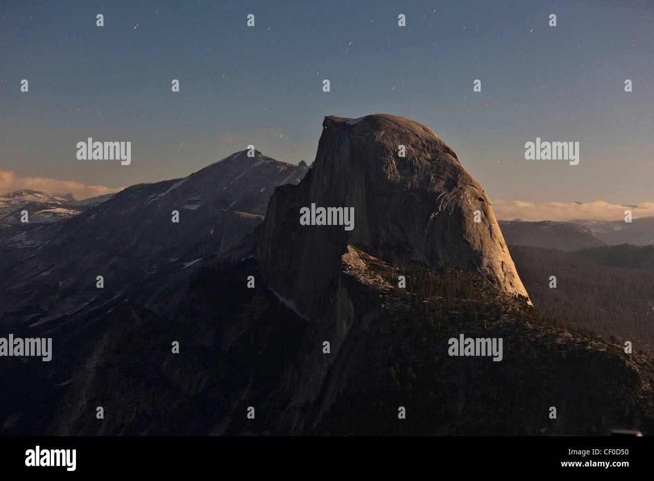 Half Dome illuminated by moonlight as seen from Glacier Point - Yosemite National Park, California Stock Photo