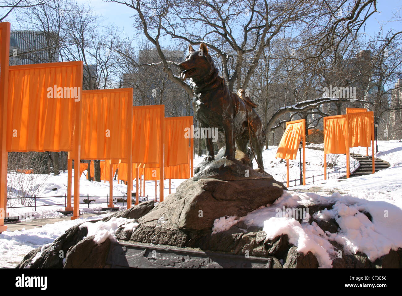 Saffron coloured gates .  Christo and Jeanne-Claude gate exhibition Central Park, New York Stock Photo