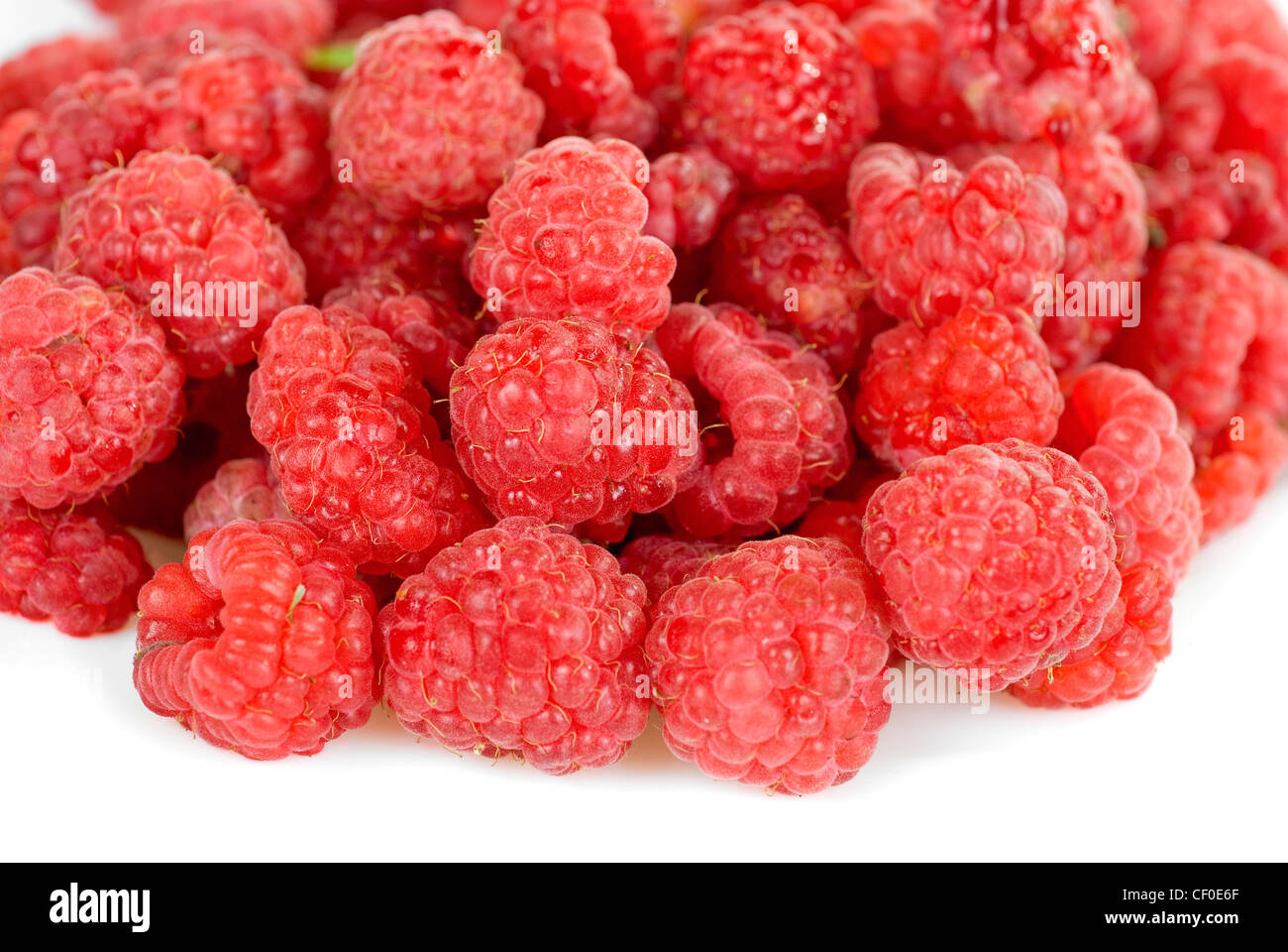 fresh raspberry closeup on a white background Stock Photo - Alamy