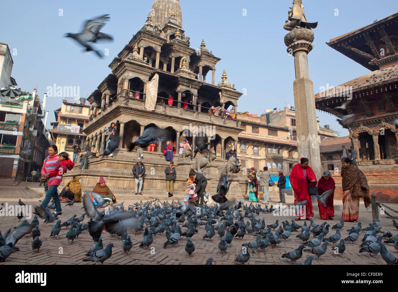 People and pigeons on Durbar Square Patan Nepal Asia Stock Photo
