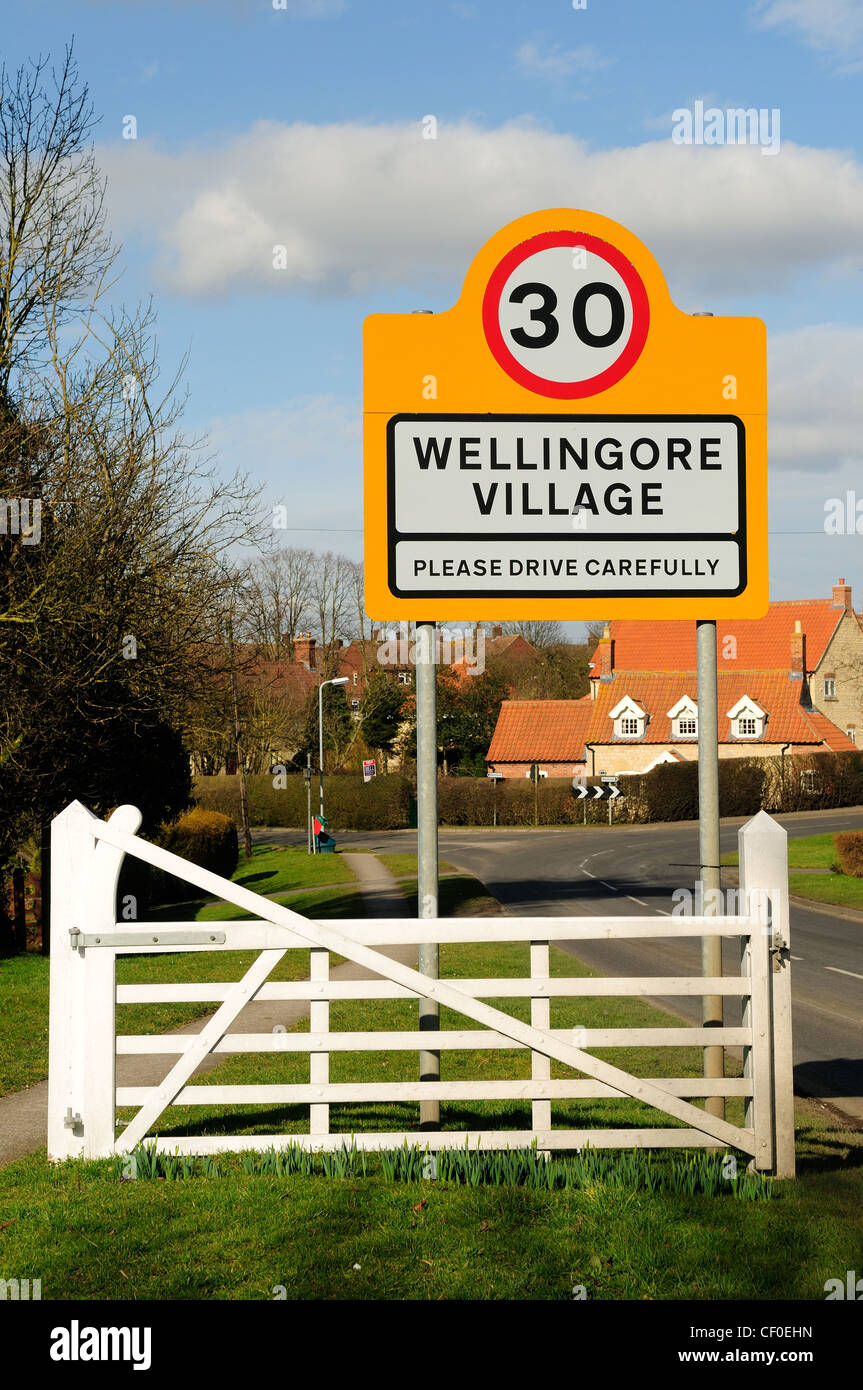 Wellingore Village Lincolnshire.Village Sign (please drive carefully) 30MPH. Stock Photo