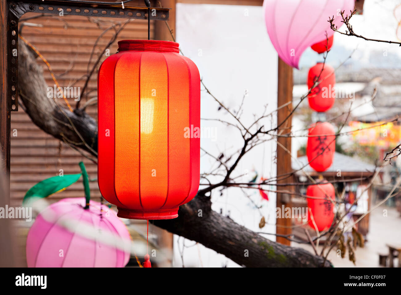 Red lantern hang on the roof at a Chinese traditional market Stock ...