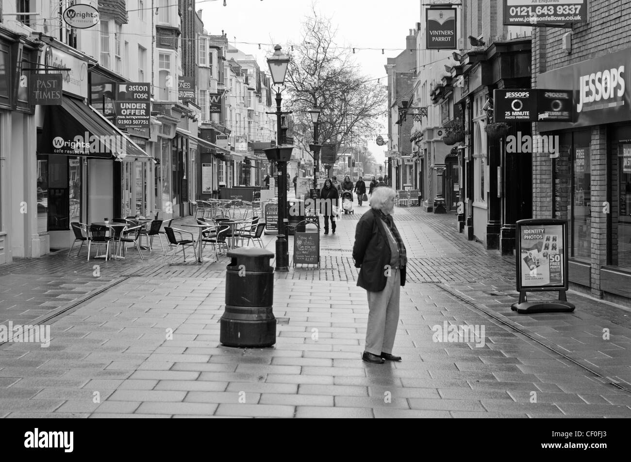 Shopping Precinct with old style buildings in England, UK, in black and white. Stock Photo