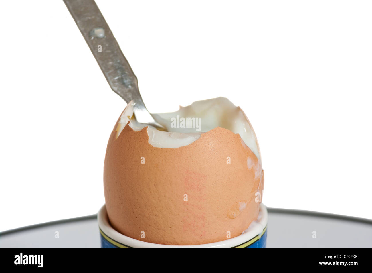 Boiled Egg In An Eggcup With A Spoon Stock Photo