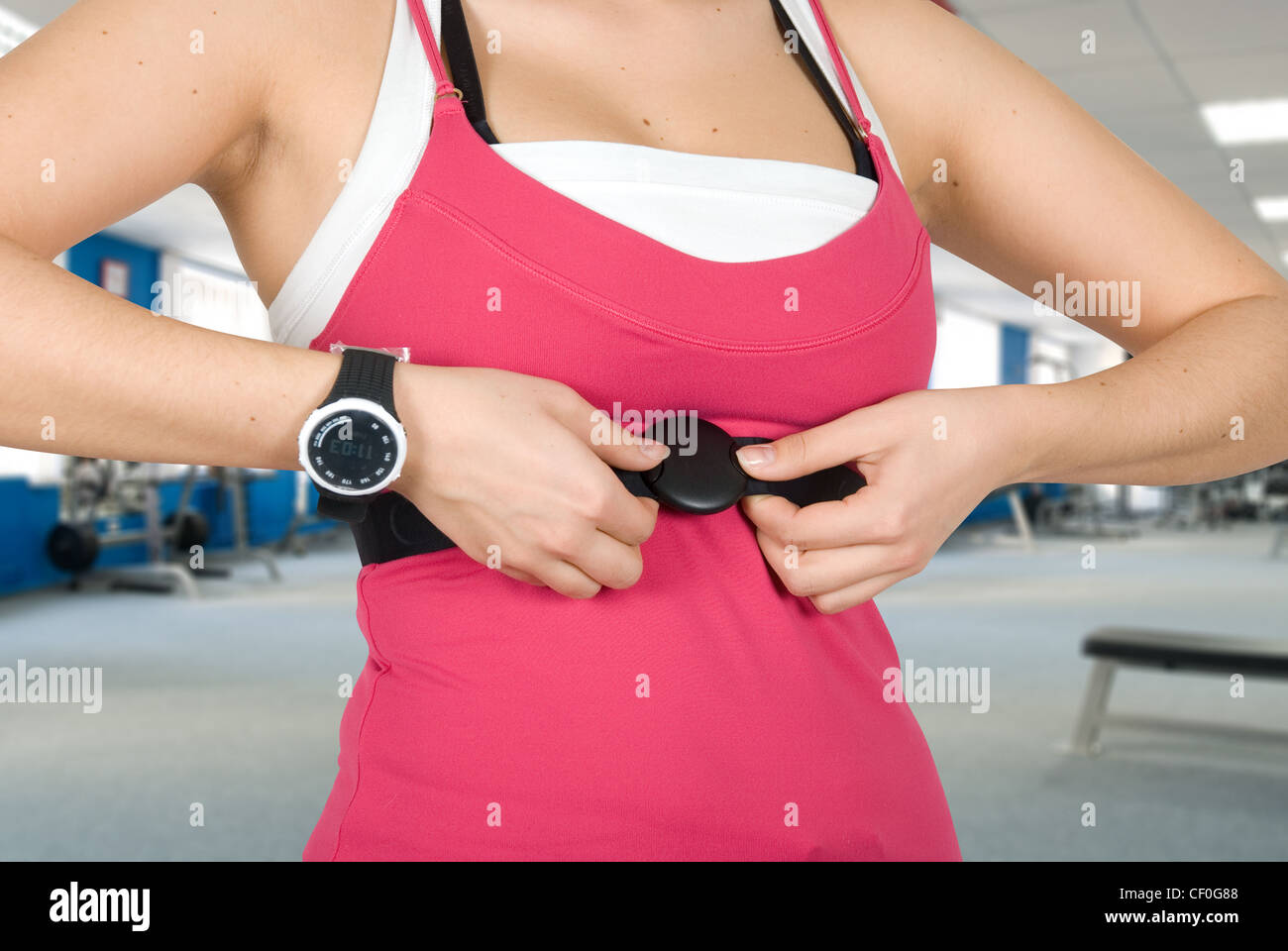 Girl with checking pulse watch closeup Stock Photo