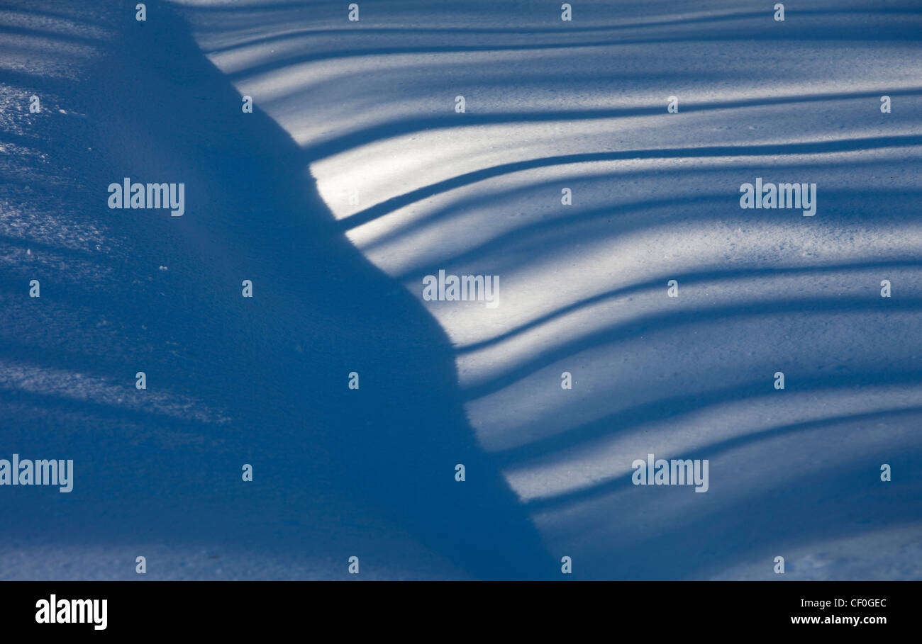Stripes on snow surface Stock Photo - Alamy