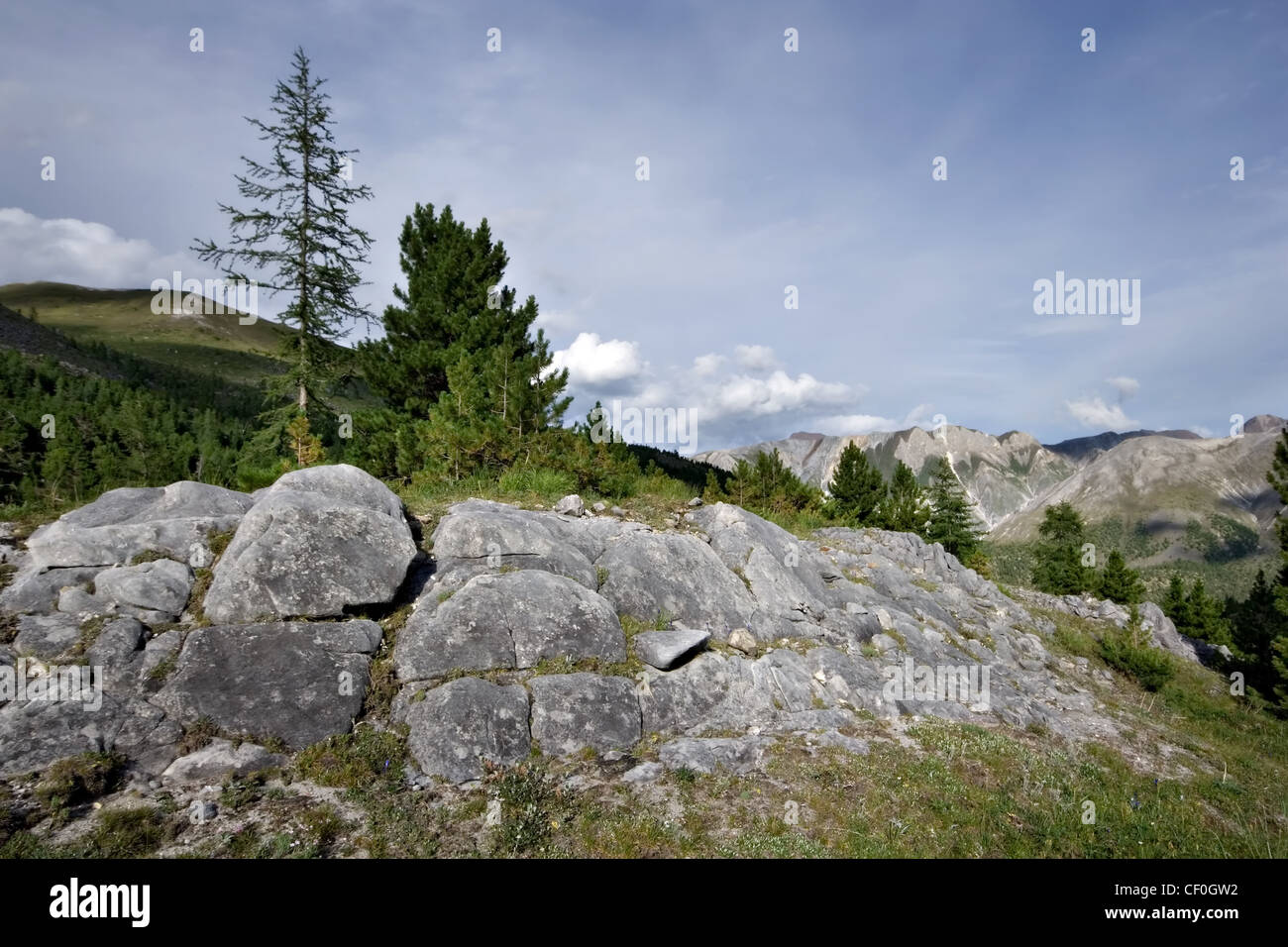 Siberia landscape with rocks, stones and boulders against blue sky with ...