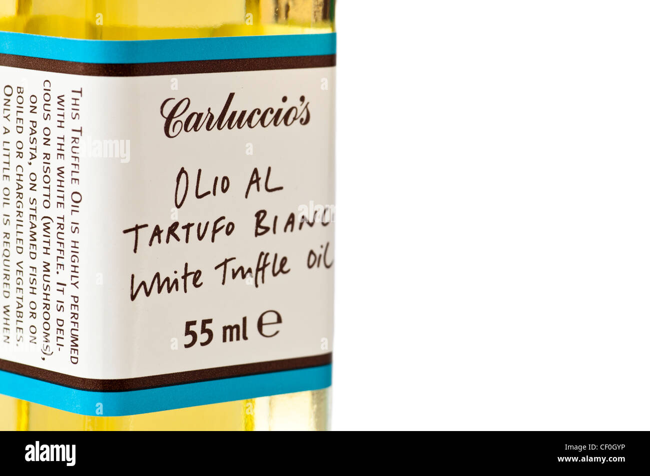 A Small Bottle of Carluccio's White Truffle Oil on a White Background. Stock Photo