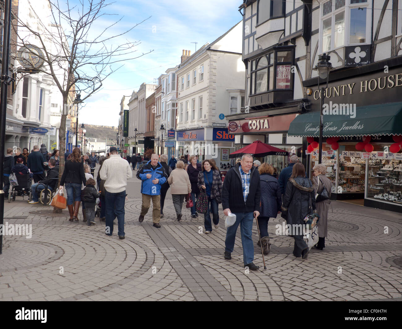 Looking down Newborough a main pedestrianised shopping street in the