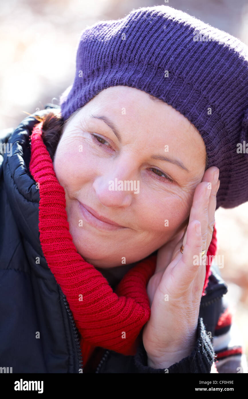 Portrait Of An Attractive 50 Year Old Woman Spending Time Outdoors 