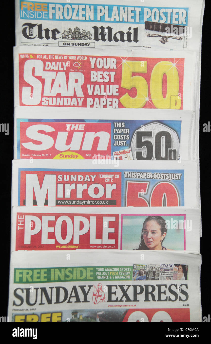 The tabloid British national Sunday newspapers inc The Mail on Sunday, Daily Star on Sunday, The Sun on Sunday & Sunday Mirror. Stock Photo
