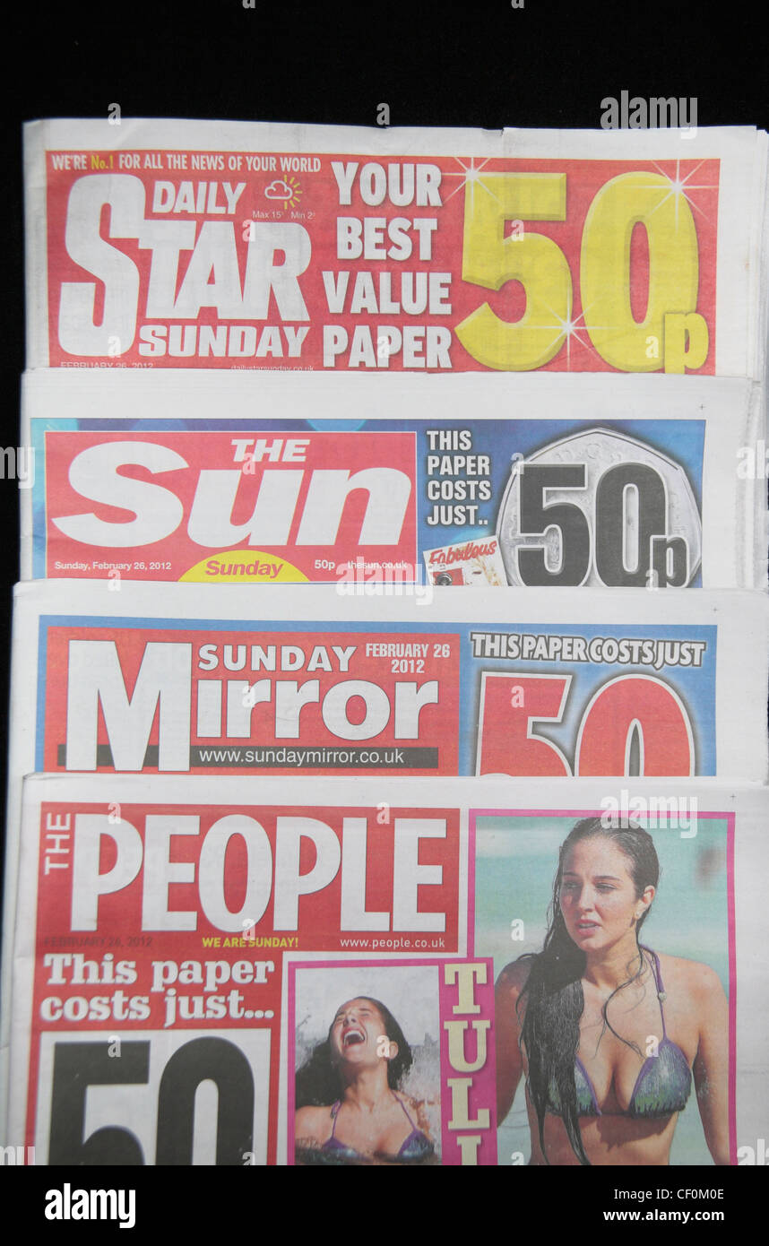 The tabloid red top British national Sunday newspapers:Daily Star Sunday, The Sun on Sunday, Sunday Mirror & The People. Stock Photo