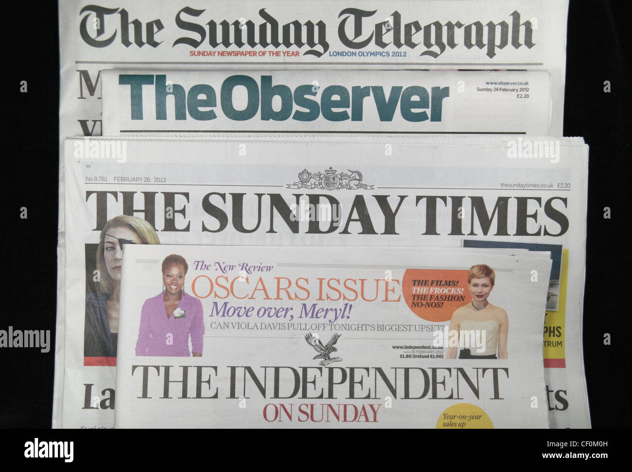 Britain's quality national Sunday newspapers, The Sunday Telegraph, The Observer, The Sunday Times & the Independent on Sunday. Stock Photo