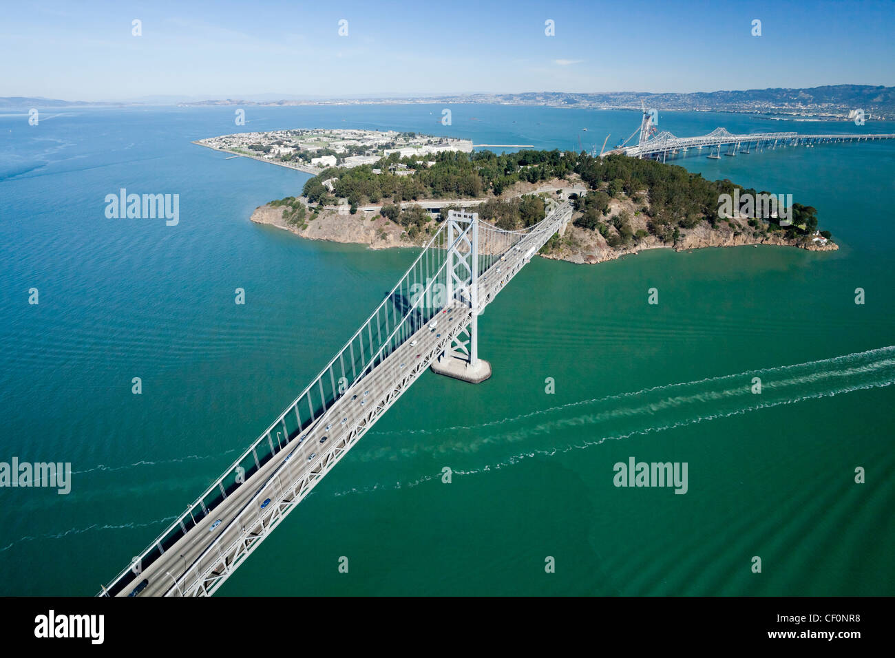 San Francisco Bay bridge traffic aerial view w Treasure Island Stock