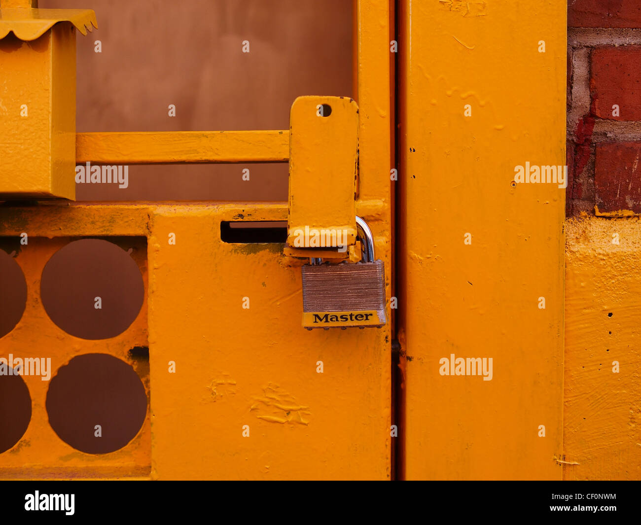 Master Lock And Yellow Security Door Brooklyn New York Stock