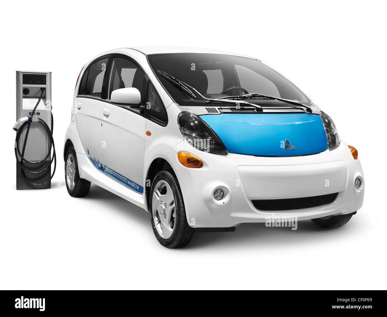 License available at MaximImages.com - 2012 Mitsubishi i MiEV electric car and a charging station isolated on white background with clipping path Stock Photo