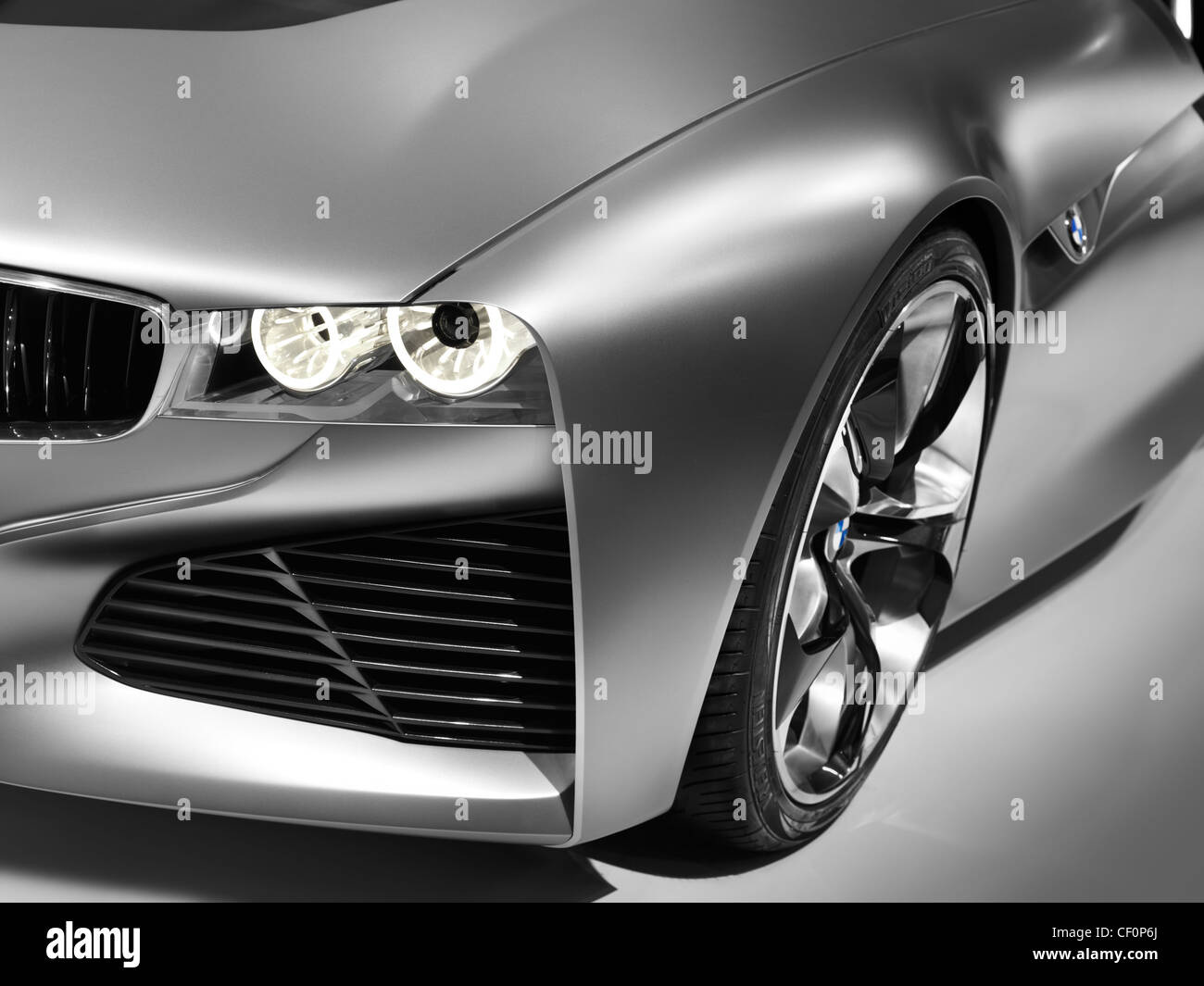 Closeup of BMW Vision ConnectedDrive concept sports car headlight and shiny body detail Stock Photo
