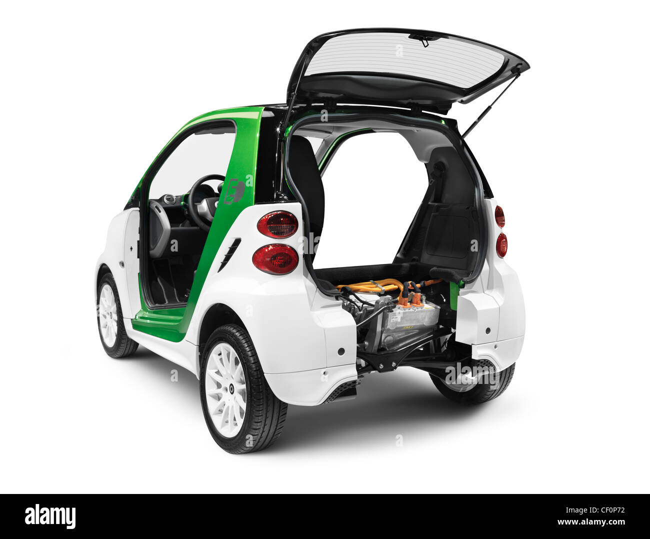 License available at MaximImages.com -  Smart ForTwo Electric Drive open from behind showing the battery and the electric motor isolated on white back Stock Photo