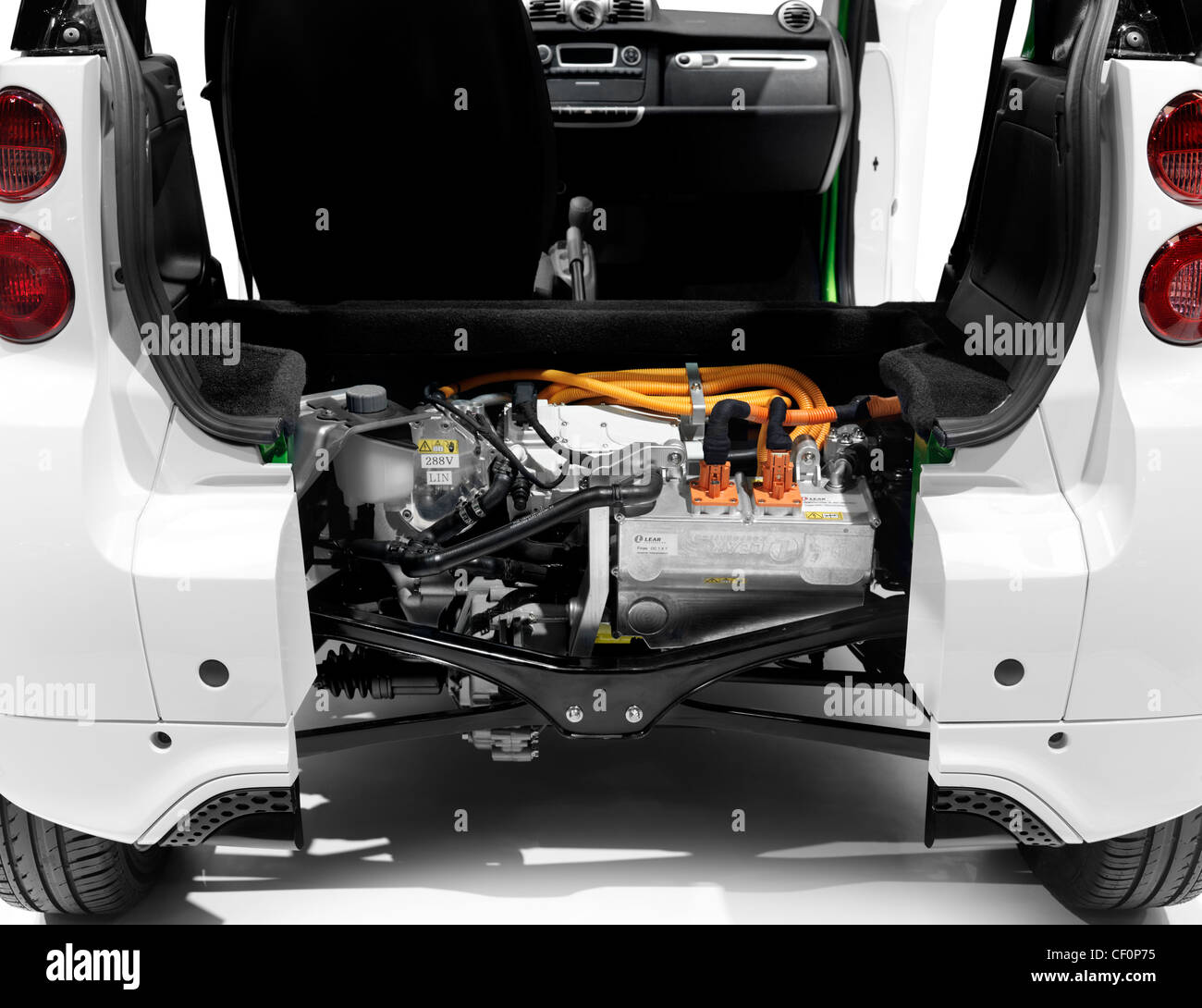 2012 Smart ForTwo Electric Drive open from behind showing the li-ion battery  and the electric motor closeup Stock Photo - Alamy