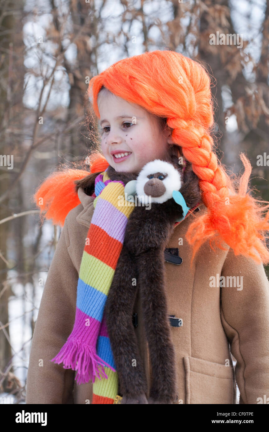 Little girl dressed like Pippi Longstocking Stock Photo - Alamy