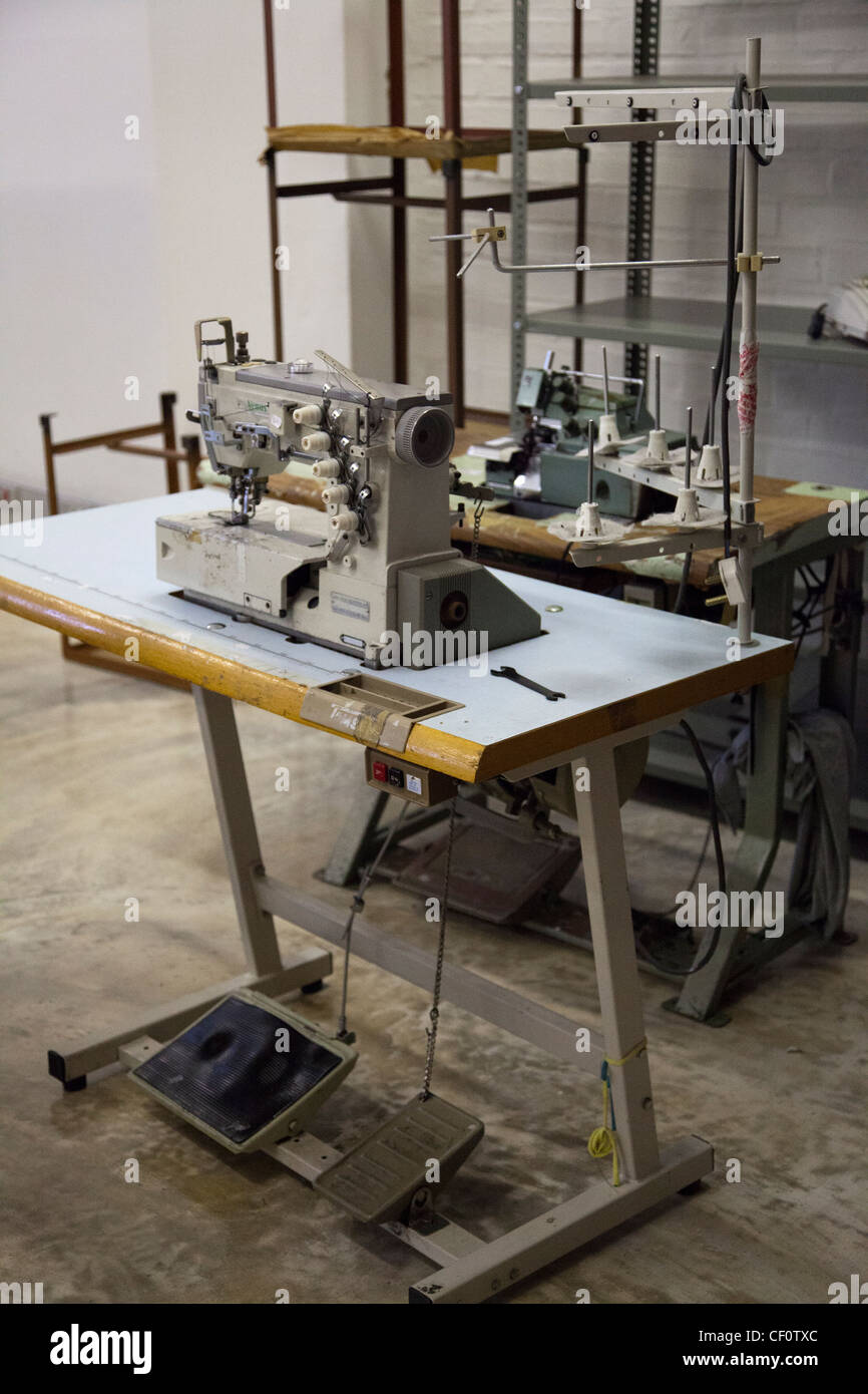 Working Clothes Machine Sewing Machines in Clothing Workroom in South Africa Stock Photo - Alamy