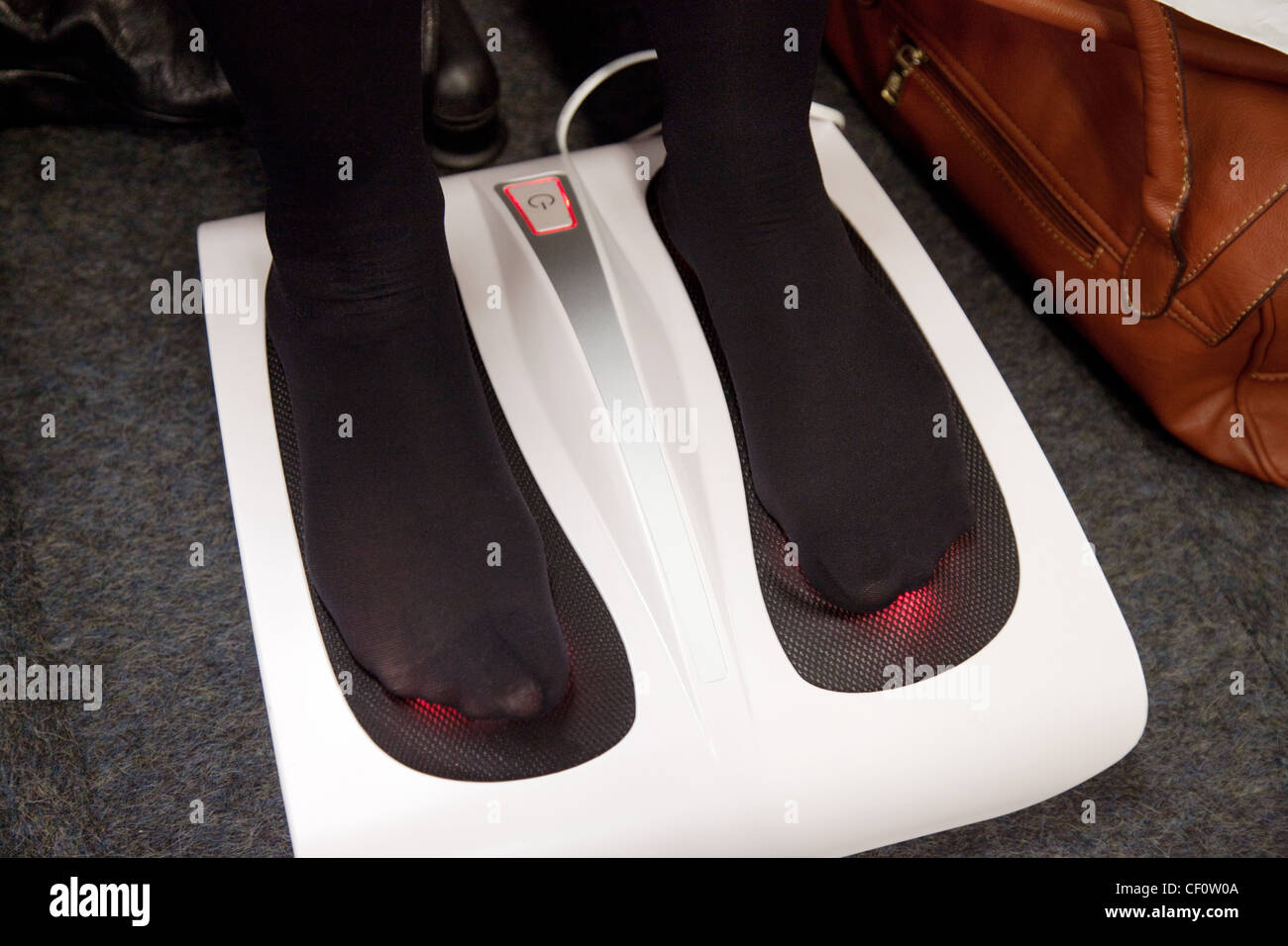 Foot pain massage treatment  London 2012, UK Stock Photo