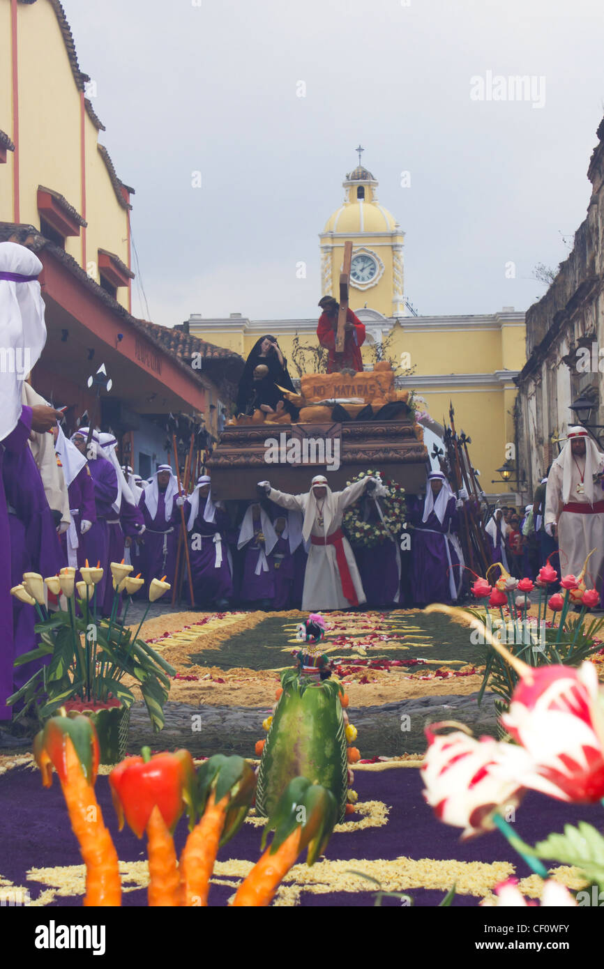 Jesus procession on decorated carpet in Semana Santa Antigua Guatemala Stock Photo