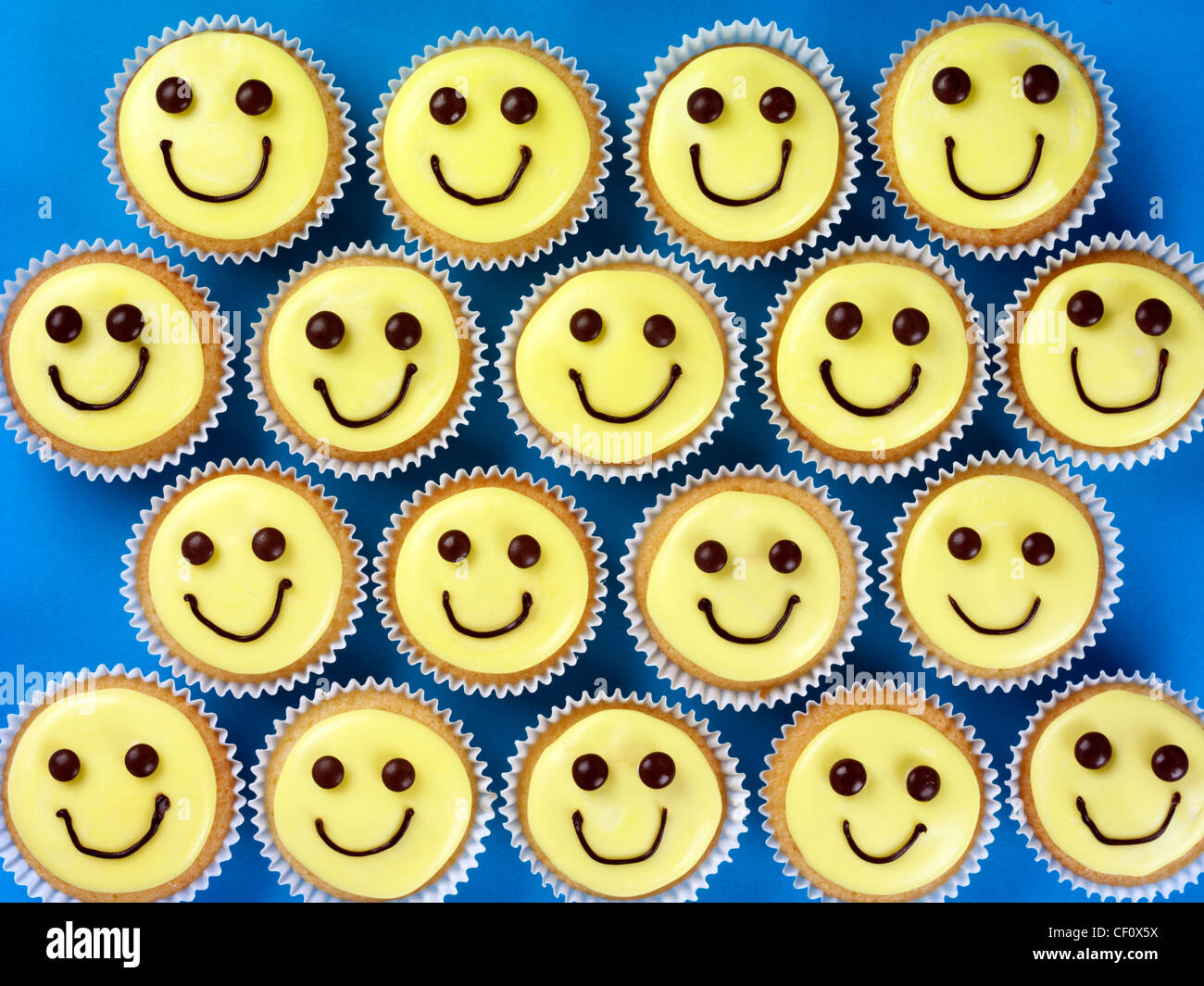 Download Yellow Smiley Faces Cupcakes Stock Photo Alamy PSD Mockup Templates
