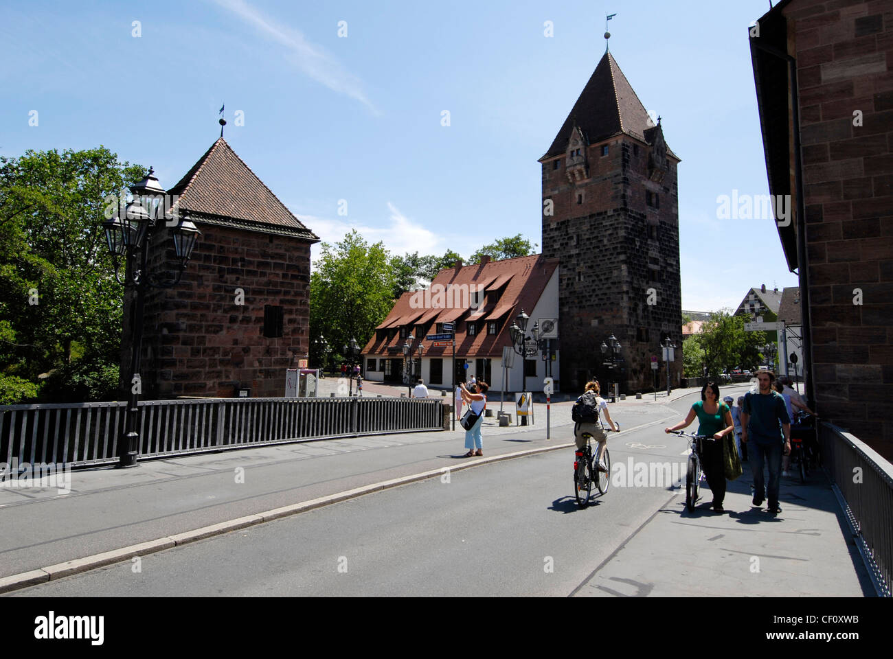 The Schuldturm tower (The Debtors Tower) built in 1323 on the Spitalbrucke across the river Pegnitz in Nuremberg, Germany Stock Photo